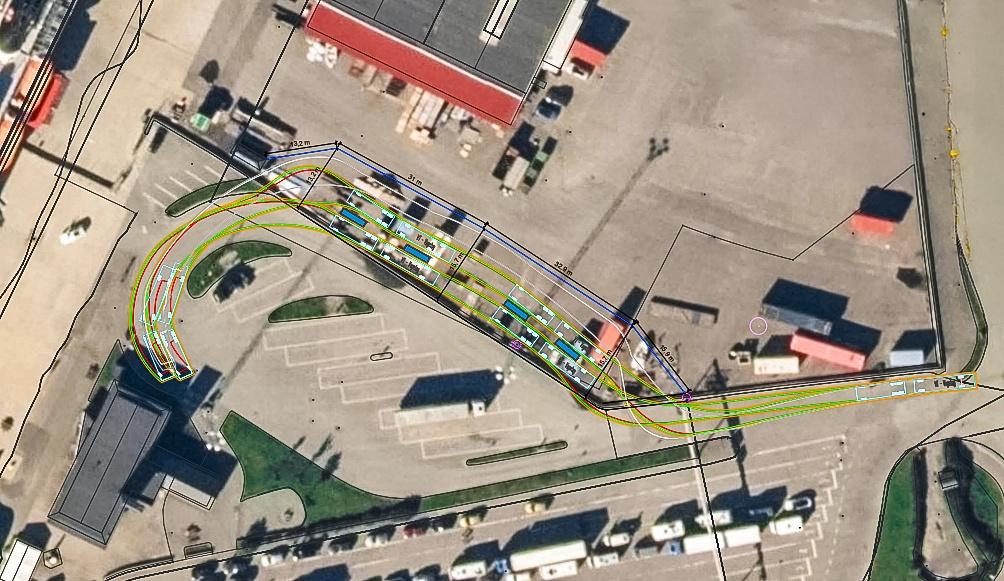 Flyfoto av Terminalkaia i Bod&oslash; med inntegnet planlagt plassering av laderne p&aring; det nye ladetorget for tyngre kj&oslash;ret&oslash;y.